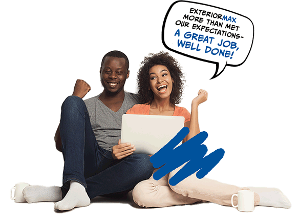 A family sitting saying "ExteriorMax more than met our expectations - A great job well done!"
